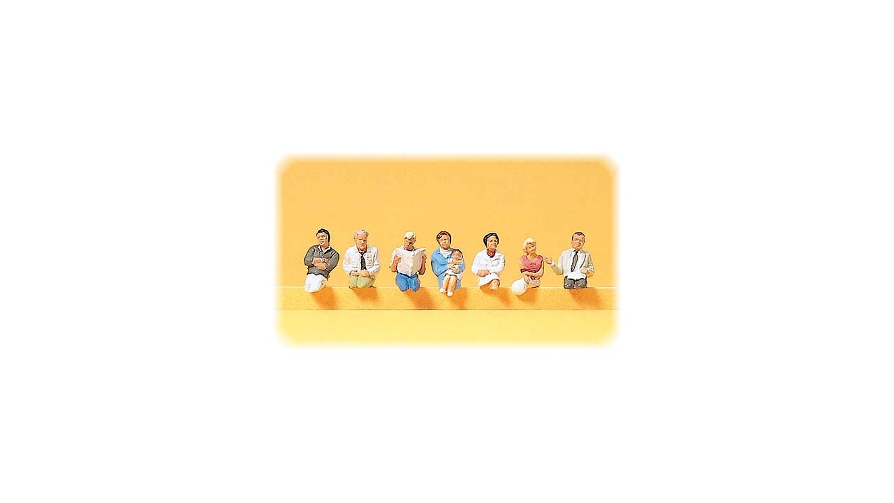 Zittende reizigers in coupe