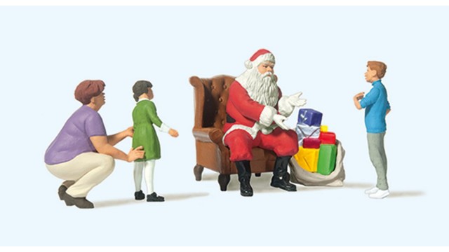 1:87 Kerstman in stoel, moeder en kinderen