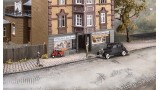 Gietmal - "Rechte Teerweg" met beschadigde delen en scheuren